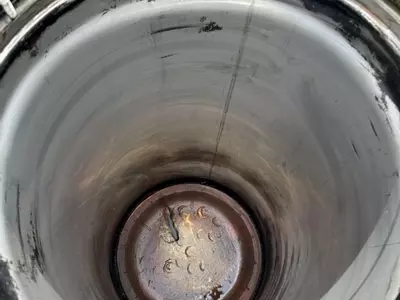 Cleaned boiler jacket on Nilfisk Contractor hot pressure washer after removing burst heating coil and soot buildup.